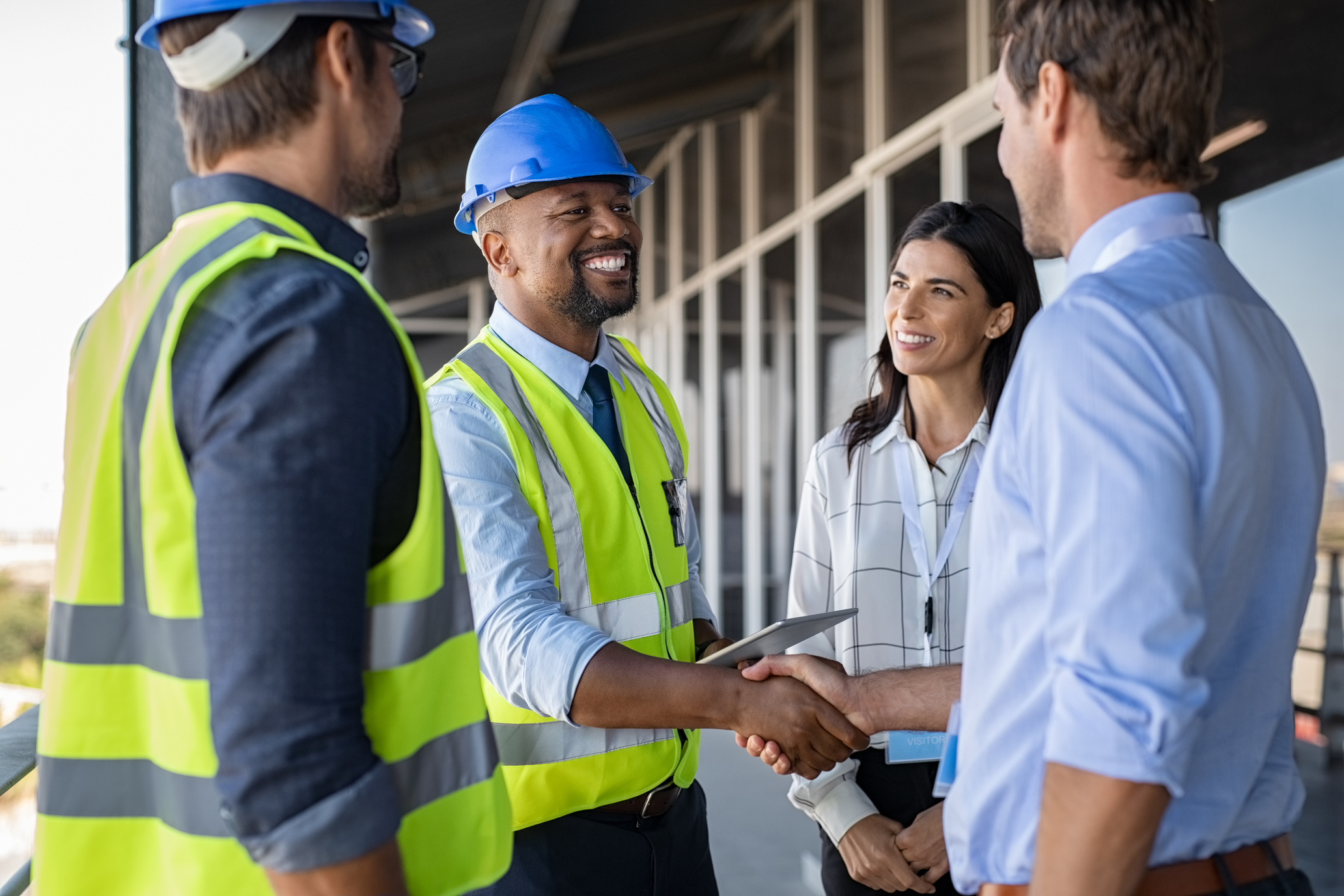 Engineer and Businessman Shaking Hands